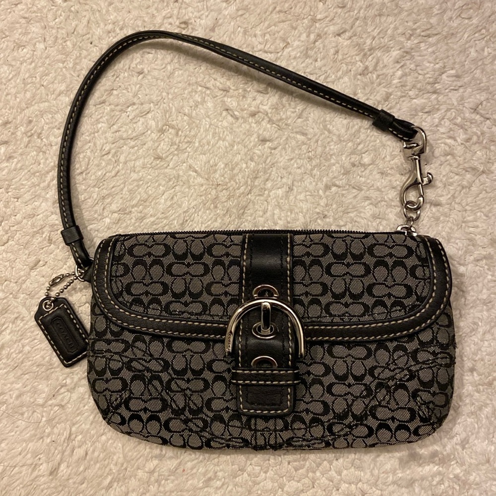 Small Black and gray Coach wristlet.